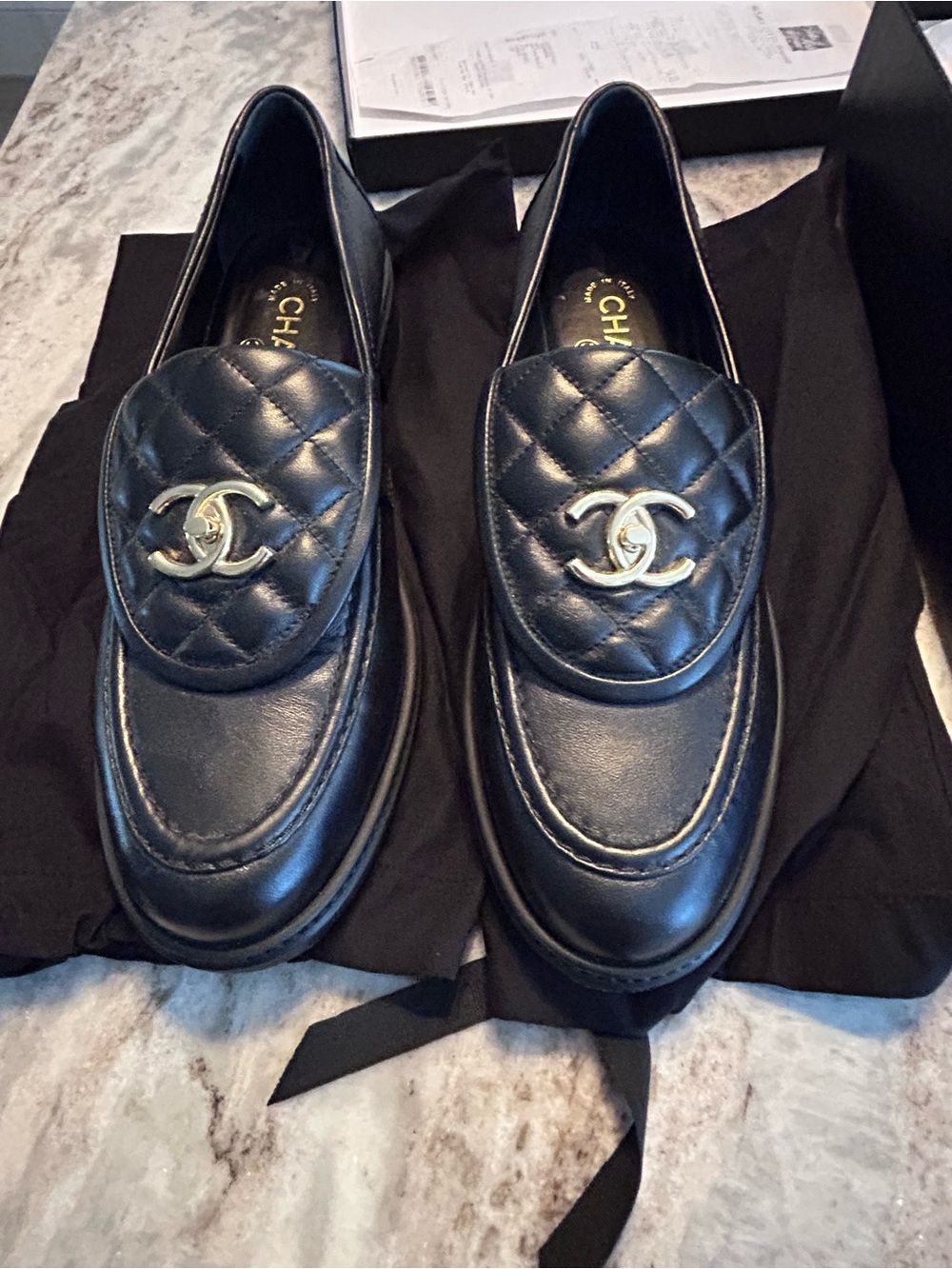 CHANEL Black Quilted Leather Logo Loafers